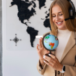Professional human translator wearing a headset and holding a globe, representing 100% human translation services, global language expertise, and culturally accurate communication