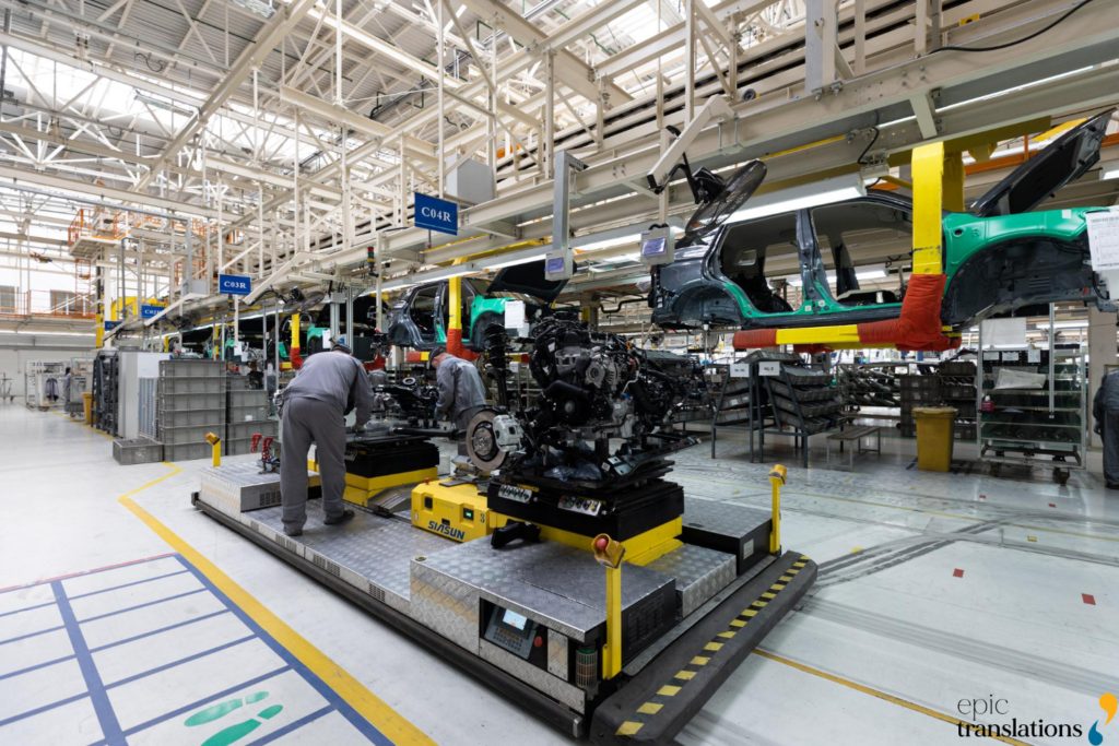 Automotive manufacturing assembly line illustrating product manual translation services for technical documentation, safety instructions, and global manufacturing operations.